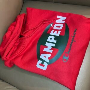 Champion Red Hoodie with Bold Graphic